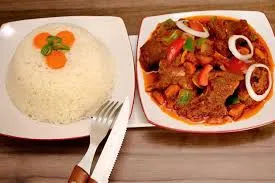 Goat stew and plain rice